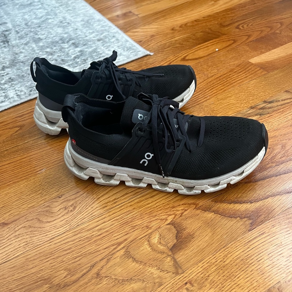 On Running Women's Black and White Sneakers